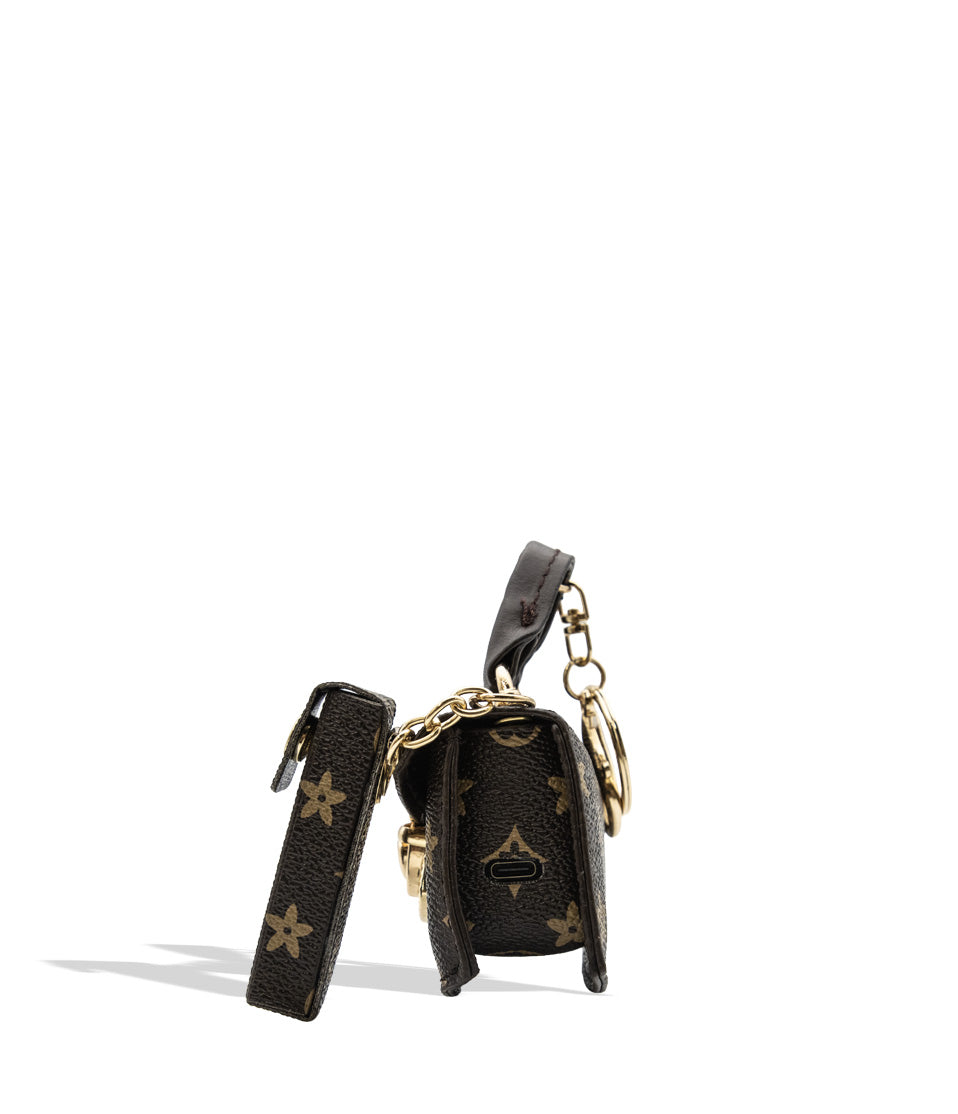 Smyle Pursejamin cartridge vaporizer side view displaying its built in USB-C port on white background